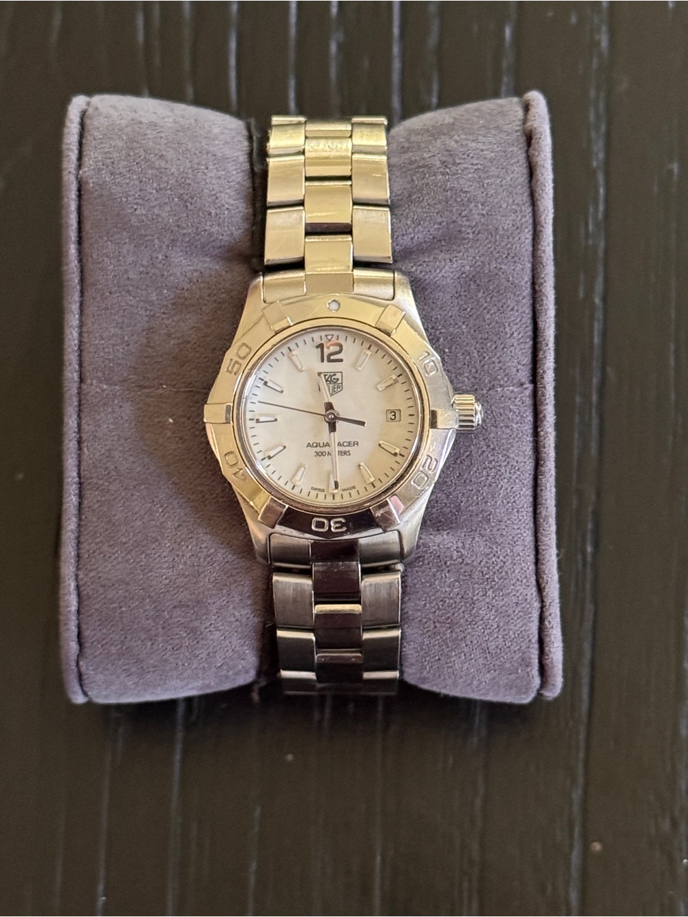 Tag Heuer stainless steel watch with silver dial white face